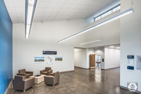 another view of commons room in educational center; on the wall are future plans of the center (phase 2); photo credit Manheim