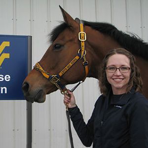 Julie with horse at WVU horse barn