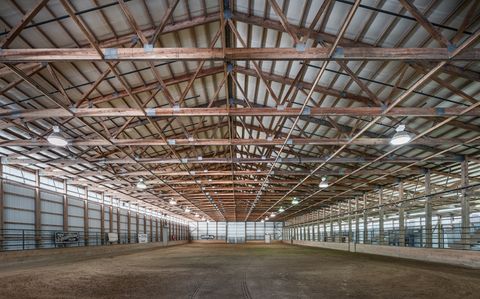 the indoor arena with the wood beams