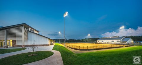 night view of equestrian education center and outdoor arena; photo credit Manheim
